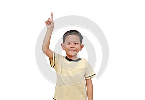 Asian little boy child pointing up isolated on white background