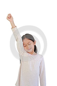 Asian little child girl stretch oneself on white isolated background