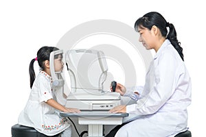 Asian Little Chinese Girl Doing Eyes Examination Through Auto re