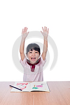 Asian Little Chinese girl drawing with color pencils