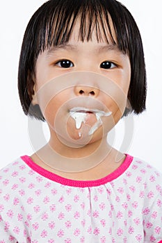 Asian Little Chinese Girl Eating Ice Cream