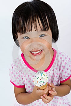 Asian Little Chinese Girl Eating Ice Cream