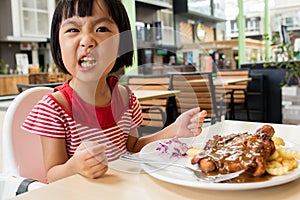 Asian Little Chinese Girl Eating Western Food