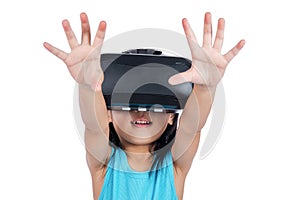 Asian little Chinese girl experiencing virtual reality via VR go photo