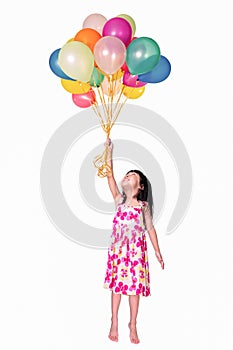 Asian little Chinese girl flying with colorful balloons