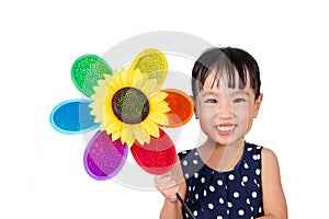 Asian Little Chinese Girl Holding Colorful Windmill