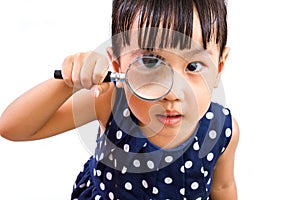 Asian Little Chinese Girl Holding Magnifying Glass