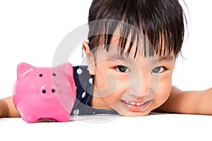 Asian Little Chinese Girl With Piggy Bank