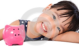 Asian Little Chinese Girl With Piggy Bank