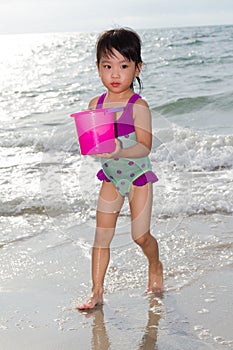 Asian Little Chinese Girl Playing with Beach Toys