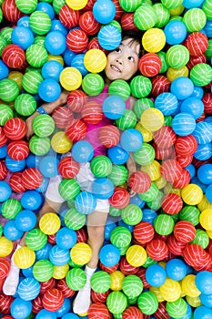 Asian Little Chinese Girl Playing with Colorful Plastic Balls