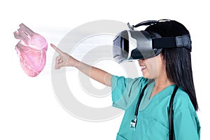 Asian Little Chinese Girl playing doctor with VR goggles