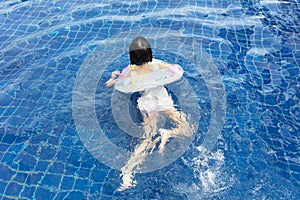 Asian Little Chinese Girl Playing in Swimming Pool