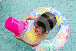 Asian Little Chinese Girl Playing in Swimming Pool