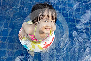 Asian Little Chinese Girl Playing in Swimming Pool