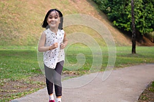 Asian Little Chinese Girl running happily