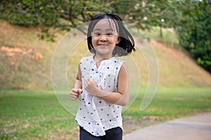 Asian Little Chinese Girl running happily