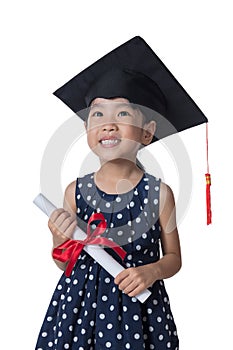 Asian Little Chinese girl sitting on floor and reading book