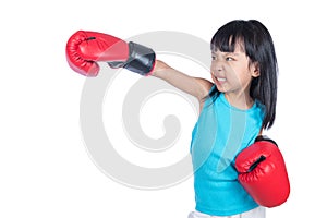 Asian Little Chinese Girl Wearing Boxing Glove With Fierce Expression