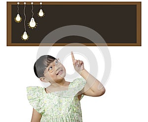 Asian little girl with blackboard with light bulb ideas on white background, Success, idea and innovation technology, Creative and