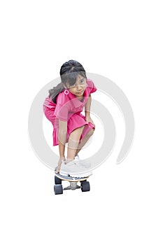 Asian little girl having fun with surfboards or surf skate is relaxing lifestyle on holiday on white background.