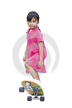 Asian little girl having fun with surfboards or surf skate is relaxing lifestyle on holiday on white background.