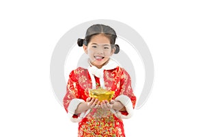 Asian little girl holding gold ingot money