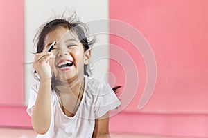 Asian little girl is laughing