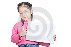 Asian little girl point to a blank sign and smile