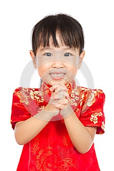 Asian Little Girl Wishing You Happy Chinese New Year with Congratulation Gesture