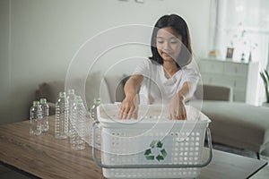 Asian Little Girls Separating Recycle Plastic Bottles to Trash Bin