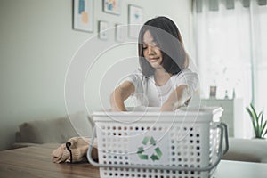 Asian Little Girls Separating Recycle Plastic Bottles to Trash Bin