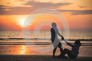 Asian lovers happy and having fun holding hands. Travel beach summer vacation