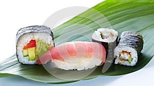 Asian maki on green leaf