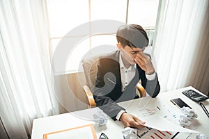 Asian male businessman professional lawyer is tired