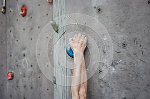 Asian male Climbing focus on right hands