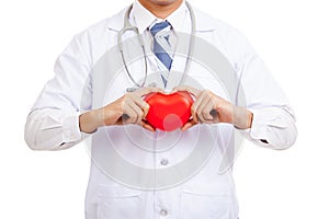 Asian male doctor show red heart