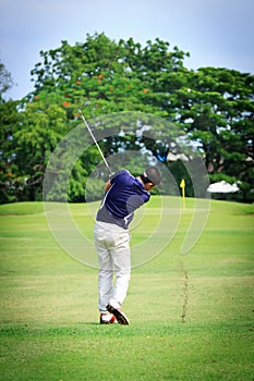 Asian Male golf player on Golf course