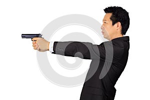 Asian male shooting a gun on white