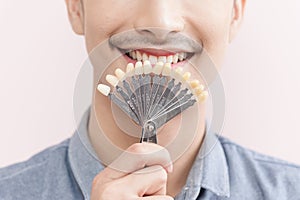 Asian male smiling in dental clinic