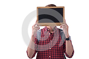 Asian male student covering his face with a chalkboard