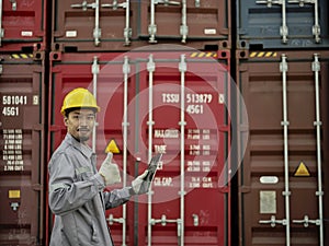 Asian male worker showing thumb as thank you or approval