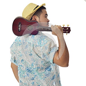 Asian man carry ukulele