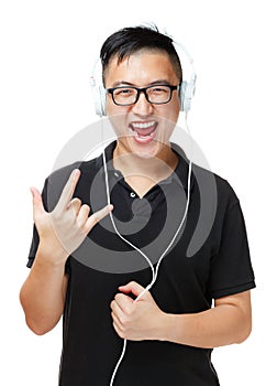 Asian man enjoy listen to music