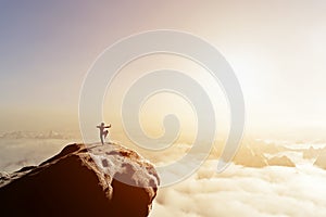 Asian man, fighter practices martial arts in mountains