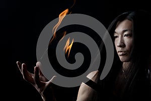 Asian man with fire show
