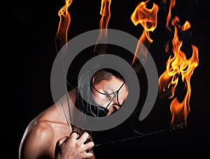 Asian man with fire show