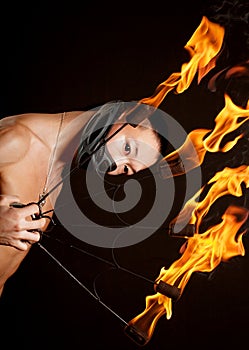 Asian man with fire show