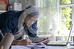 Asian man Graphic designer working in office. Artist Creative Designer Illustrator Graphic Skill Concept