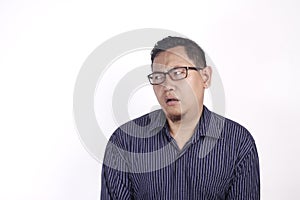 Asian Man Having Skeptical and Dissatisfied or Distrust Expression